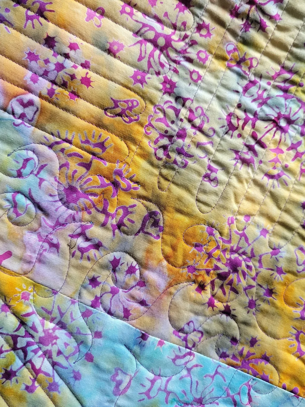 Handmade batik square quilt